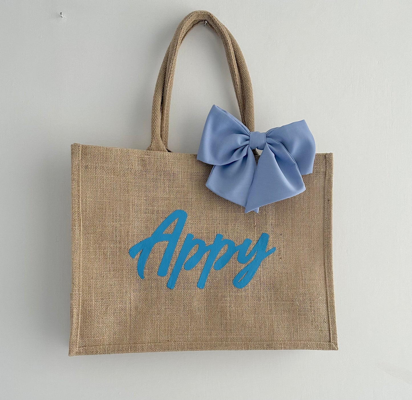 Borse mare in juta con fiocco