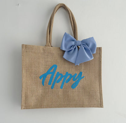 Borse mare in juta con fiocco